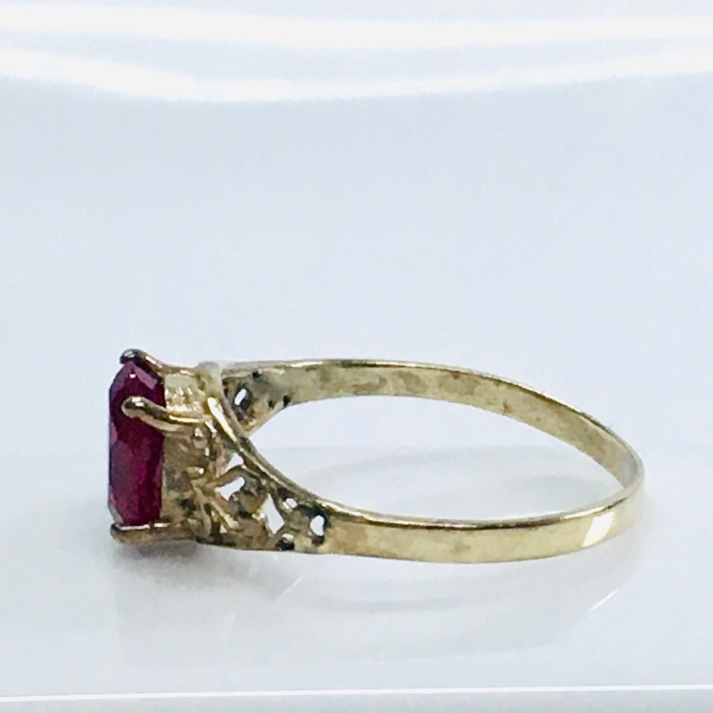 Ruby Solitaire Open Scroll Ring In 10k Gold - image 6